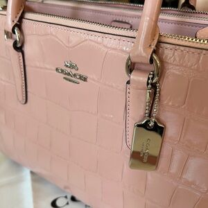 Soft pink Coach handbag